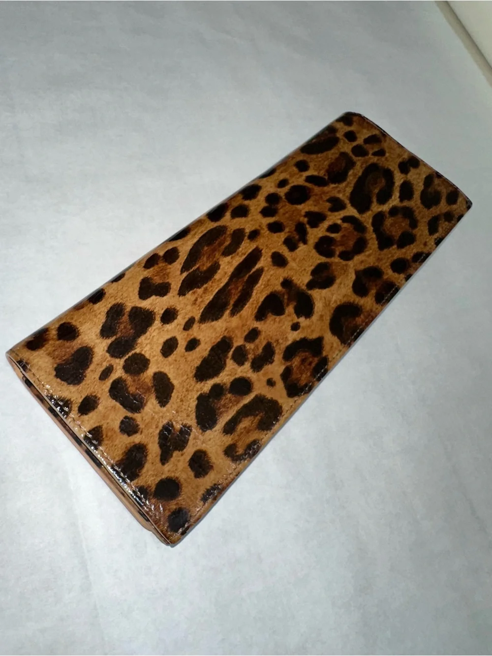 Stuart Weitzman patent leather Leopard clutch bag with a detachable strap